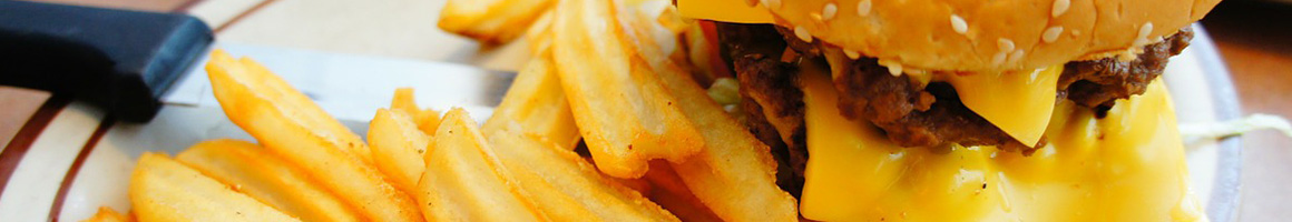 Eating Burger at Liberty Burger restaurant in Jackson, WY.